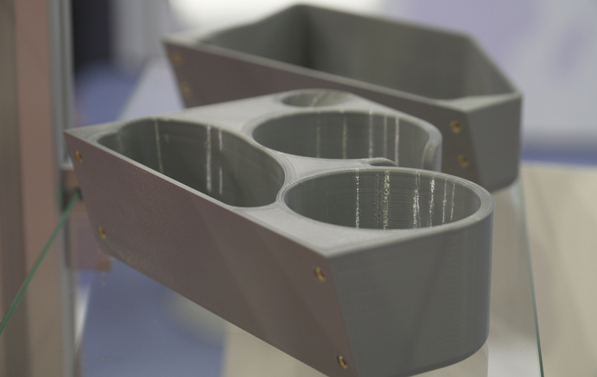 3D printed custom cup holders (ph. Stratasys)